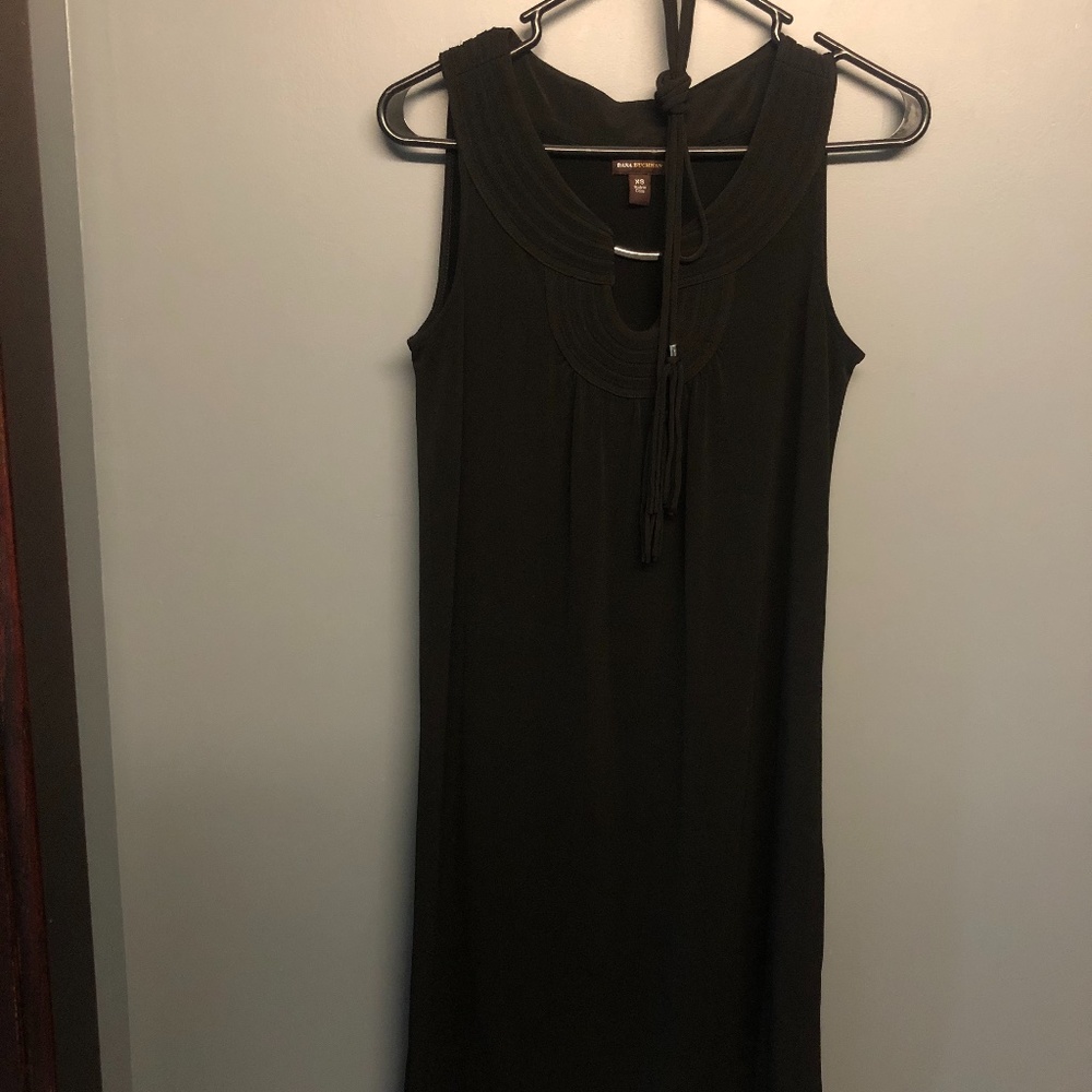 simple black dress with a fun neck line